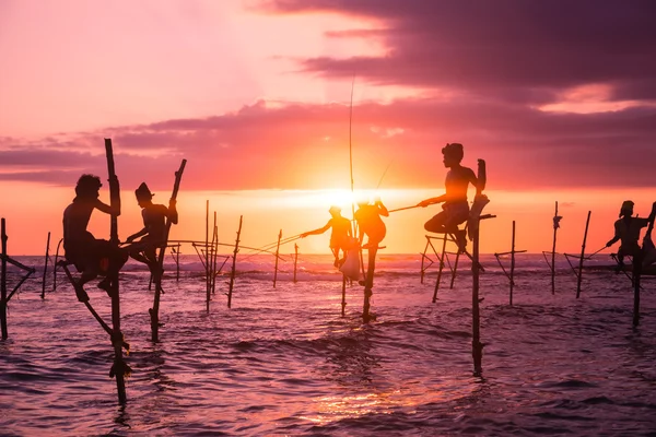 Fiskare som fiskar i unik stil Royaltyfria Stockfoton