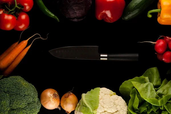 Vegetables with knife — Stock Photo, Image