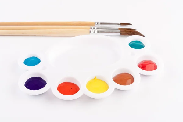 Paint brush and color palette — Stock Photo, Image