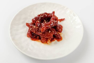 Deodeok ile yapılmış yemek. Köklerine baharat sürülmüş yiyecekler. Kore yemek kültürü