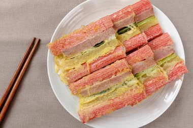 skewered meat and vegetables. Fried food dipped in egg water. Korean traditional food