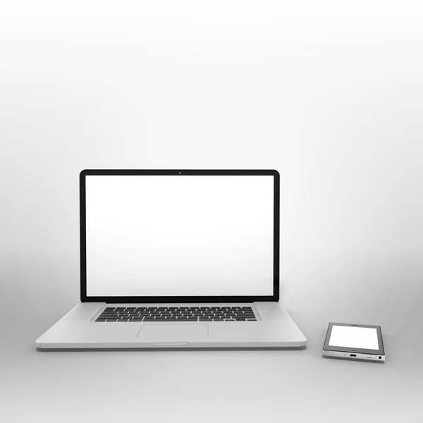 Laptop & telefono cellulare — Foto Stock