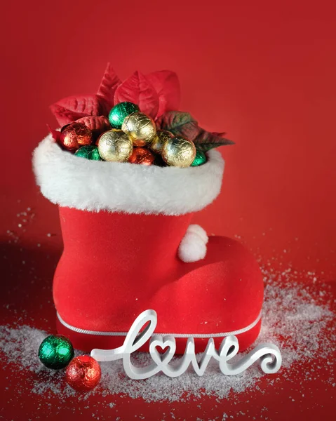 Red Santa Boot Chocolate Xmas Balls Wooden Word Love Red — Stock Photo, Image