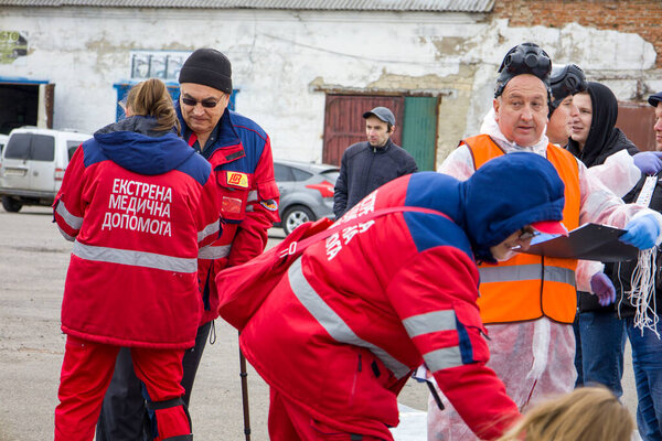 10.10.2022 Kyiv. Ukraine. Paramedics near an ambulance during training.