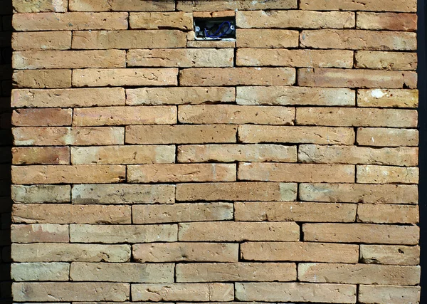 Kasteel bakstenen muur detail, power socket gat — Stockfoto