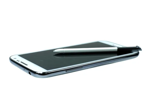 Telefone celular branco com caneta stylus — Fotografia de Stock