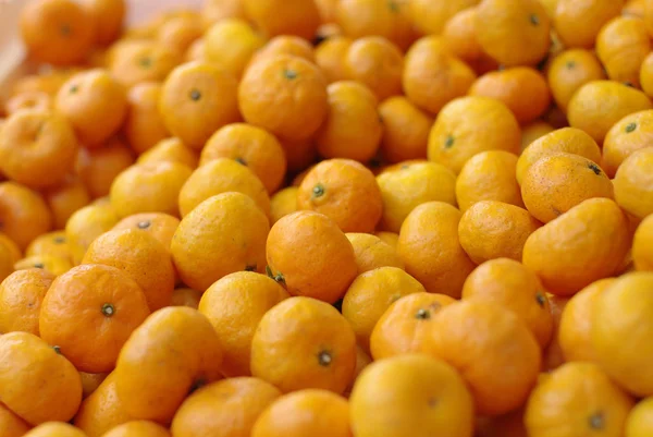 Πορτοκάλια σωρό φόντο — Φωτογραφία Αρχείου