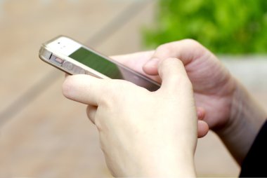 Akıllı telefonlu el.