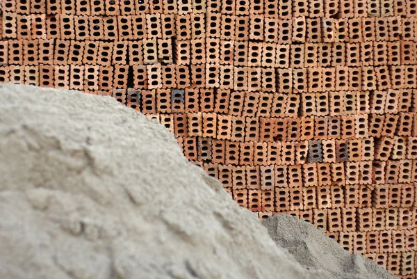 Construction brick and sand texture — Stock Photo, Image