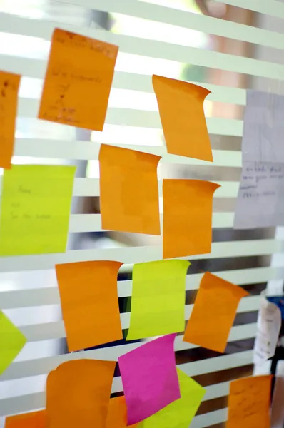 Post it reminders in office — Stock Photo, Image