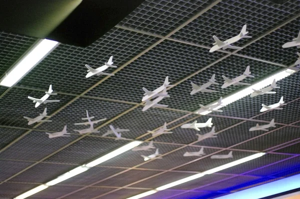 Abstrakt miniatyr flygplan som flyger — Stockfoto
