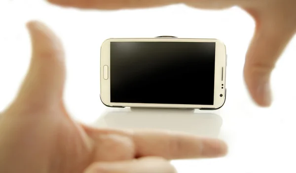 Foco da mão no conceito de telefone móvel — Fotografia de Stock