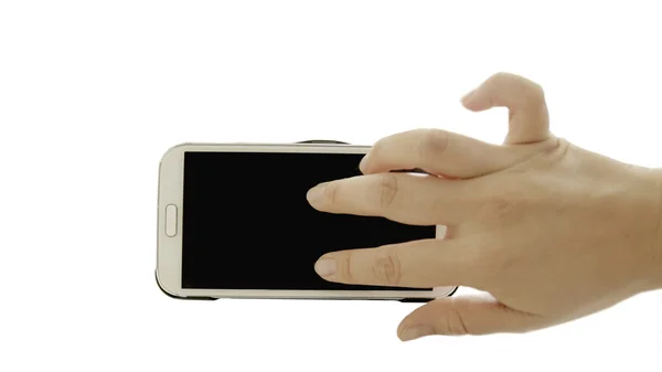 Hand zoom slimme telefoon op isoleren achtergrond — Stockfoto