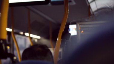 Interior of bus public transportation in Copenhagen, Denmark blur evening view with no face