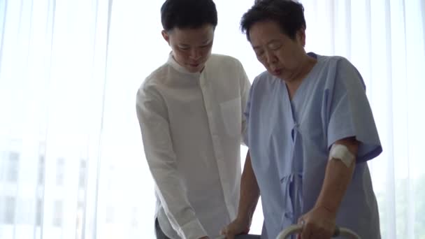 Asian Son Help Mom Walking Physical Theraphy Accident Positive Vibe — Wideo stockowe