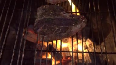 BBQ pork chop on charcoal frame grill barbecue party 4th of july