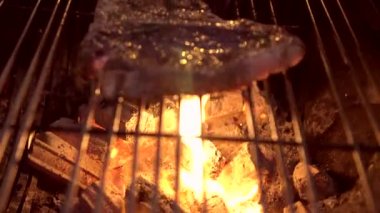BBQ pork chop on charcoal frame grill barbecue party 4th of july