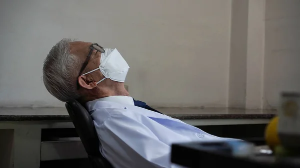 Asian Senior Man Overworked Stress Napping While Wearing Mask Tired — Foto Stock