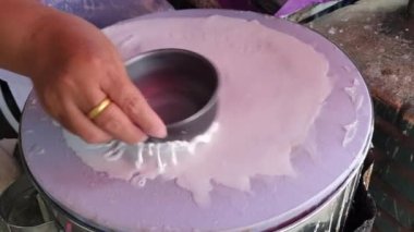 Banh cuon Vietnamese rice flour steamed paper with egg traditional local street food of Vietnam cooking process