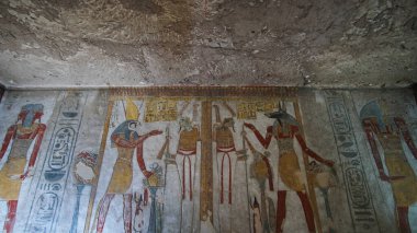 Valley of the kings Luxor Egypt Tomb of Tausert and Setnakht heiroglyphic painting with pastel color beautiful yellow and blue fresco style art clipart