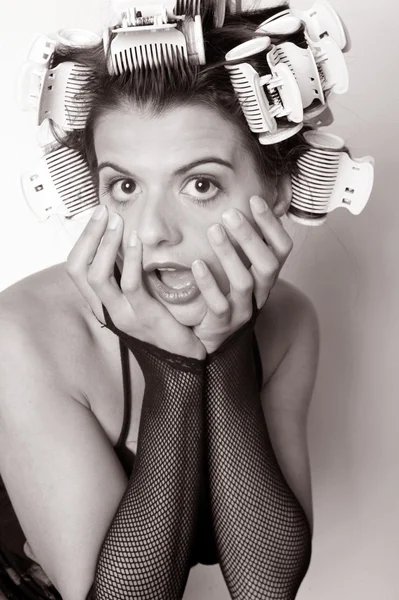 Young woman with curlers — Stock Photo, Image