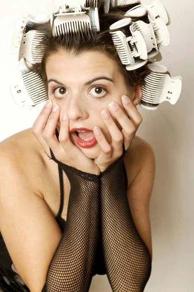 Young woman with curlers — Stock Photo, Image