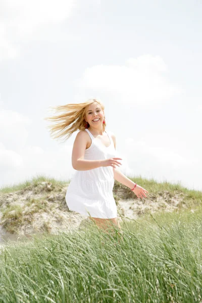 Young blonde woman in nature — Stock Photo, Image