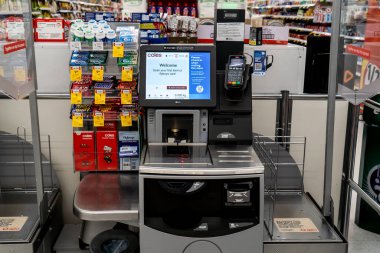 Sydney, Australia 2021-10-13. Self serve checkout at Coles supermarket during Covid pandemic. clipart