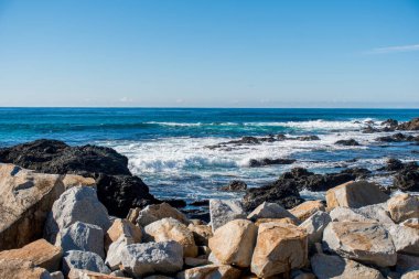 Rocks and pillow lava rock formation on the pacific ocean shore. Travel destination. Narooma, NSW, Australia