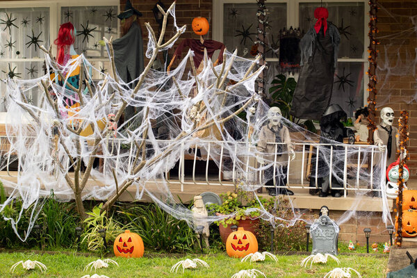 Halloween house home outside decoration. Front porch haloween party trick or treat spooky decor