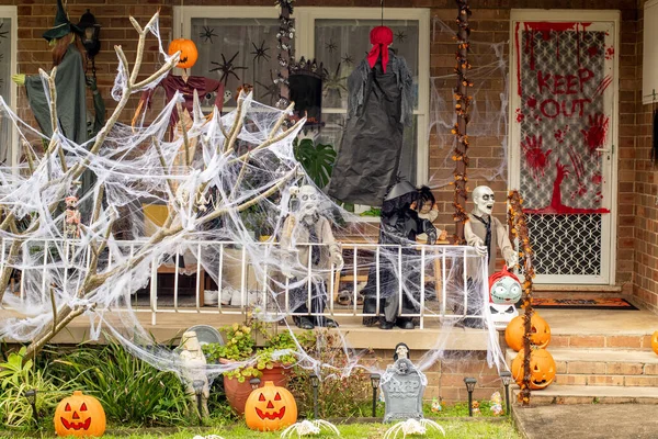 Halloween house home outside decoration. Front porch haloween party trick or treat spooky decor