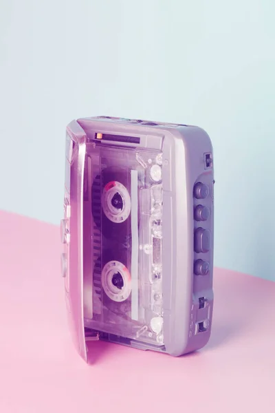 Old audio player with cassette on neon color. retro style. — Stock Photo, Image