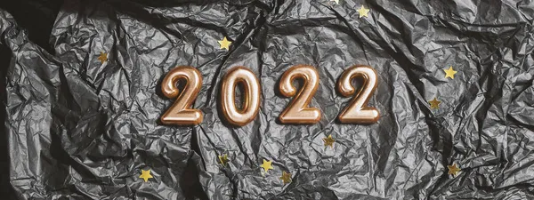Números 2022 Sobre Fondo Arrugado Negro Con Estrellas Arriba Ver — Foto de Stock