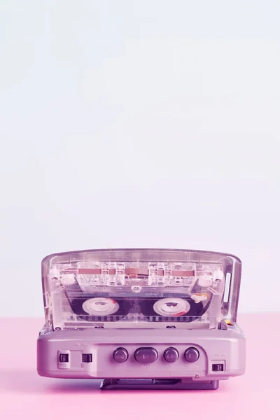 Old audio player with cassette on neon color. retro style. — Stock Photo, Image