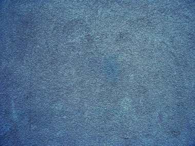 Sıvalı bir duvarın dokulu bir yüzeyinin arka planı.