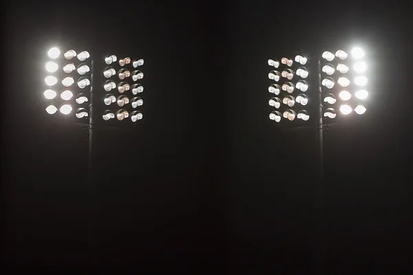 Stadium lights against dark night sky background — Stock Photo ...