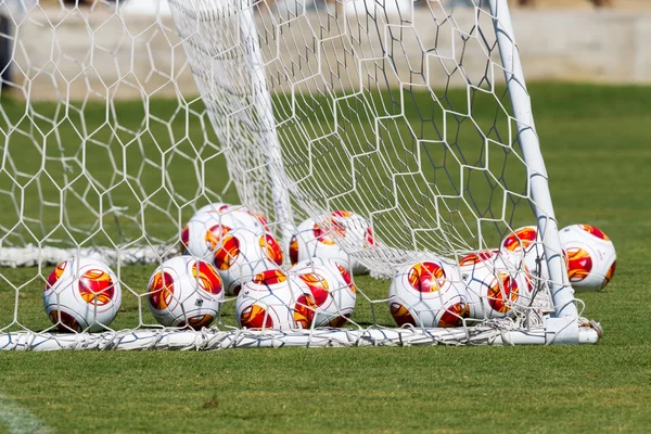 Europa League balls in net during Paok training — Stock Photo, Image