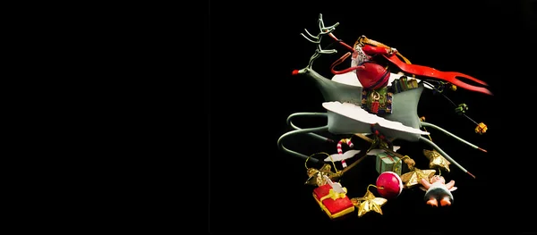 Christmas decoration, Santa Claus on black background — Stock Photo, Image