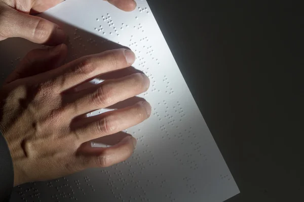 Blind reading text in braille language — Stock Photo, Image