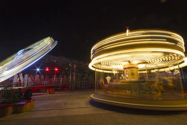 Luna park carousel in a public outdoor area — Stock Photo, Image