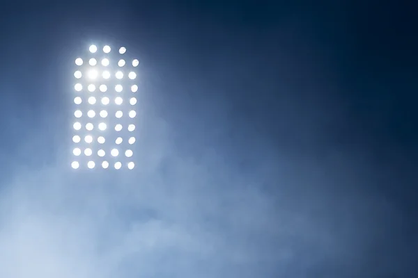 Stadium lights against dark night sky backgroundon — Stock Photo, Image