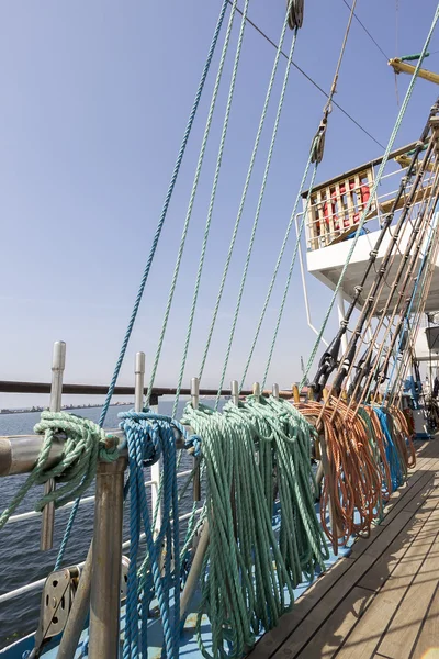 Thick ropes on a wooden sailing ship floor — Stock Photo, Image