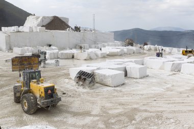 A loader in marble quarry clipart