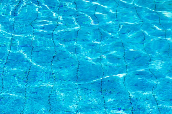 Swimming pool with sunny reflections — Stock Photo, Image