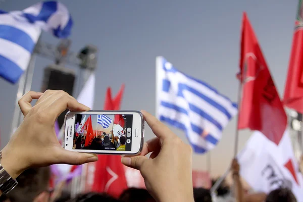 Phone recording Alexis Tsipras leader of Syriza party giving pre — Stock Photo, Image