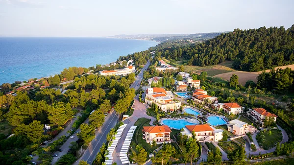 Aerial view of luxury hotel with pools, buildings and nature sur — Stock Photo, Image