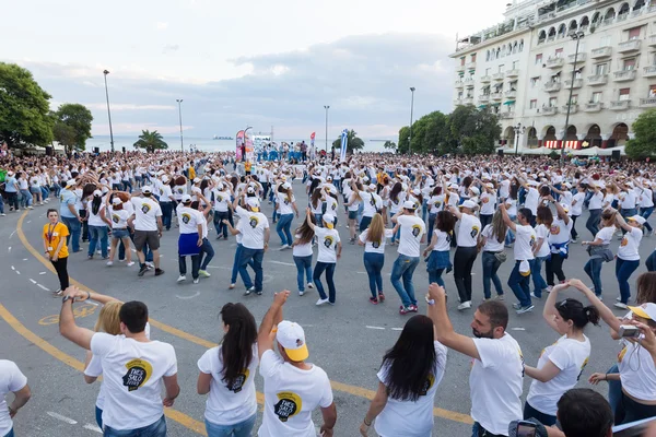 Rueda de casino flash mob, particular type of Salsa held in The — Stock Photo, Image