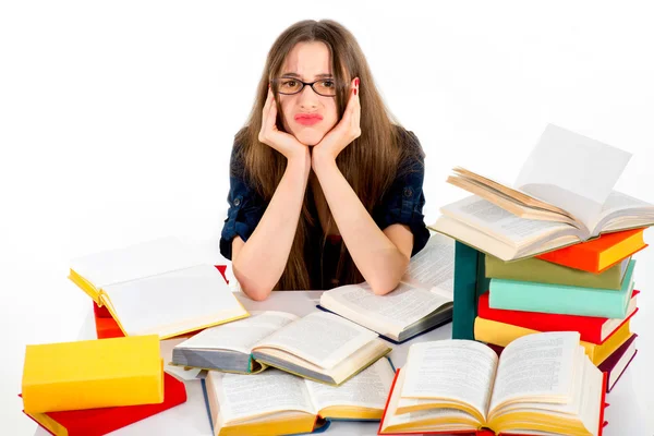 Young girl don't want to study, she is tired, siting in surround — Stock Photo, Image