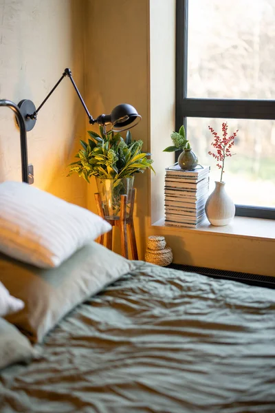 Festively decorated bedroom with twigs of nobilis — 图库照片