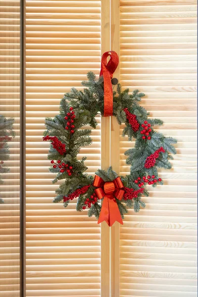 Christmas wreath on wooden shutters — Fotografia de Stock